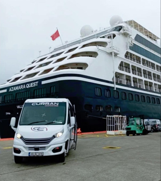 MS Albatross Cruise ship in Killybegs Harbour greeted by Curran Coaches Tour Buses, County Donegal, Ireland