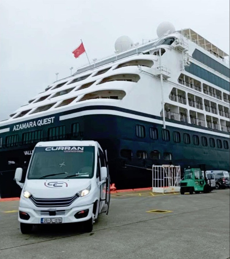 MS Albatross Cruise ship in Killybegs Harbour greeted by Curran Coaches Tour Buses, County Donegal, Ireland